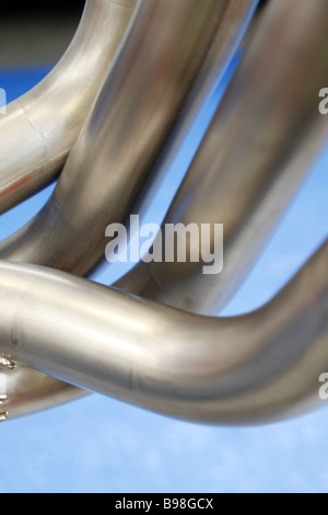 close up detail of exhaust pipes on sports racing motorbike at motor show Stock Photo