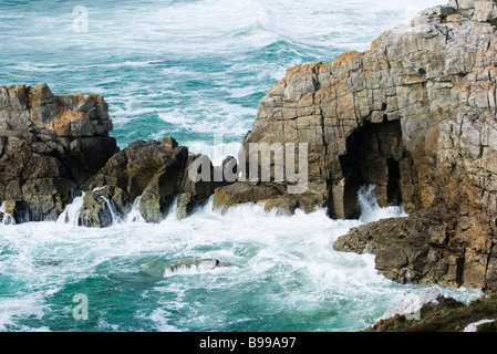 Waves crashing on coastal cliffs, Brittany, France Stock Photo