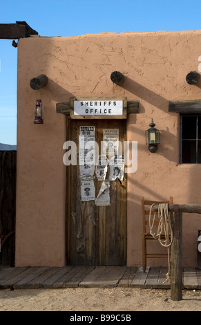 Old western Sheriff's office and jail with wanted posted on the door at the Pioneer Living History Village Museum in Phoenix, Arizona, USA. Stock Photo