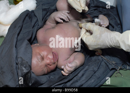 new born black baby girl in hospital