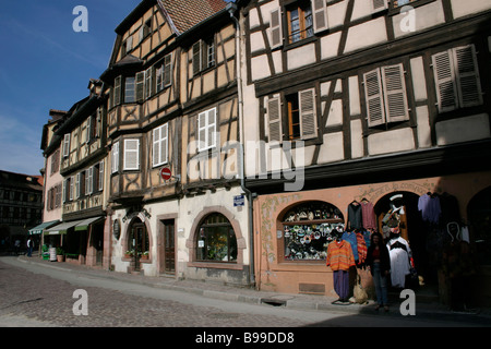 Street in old town Historic 17th and 18th century buildings Half timbered Shops KAYSERSBERG ALSACE FRANCE