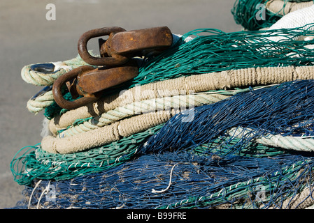 Nautical braided rope fishing hook bracelets with spare hooks arranged on a  blue wooden background Stock Photo - Alamy