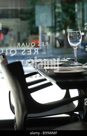Set table in restaurant interior Stock Photo