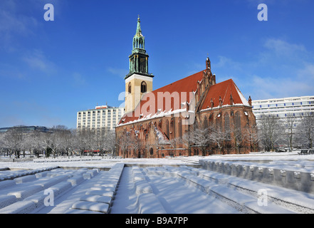 Neptun fountain berlin snow marien church germany Stock Photo