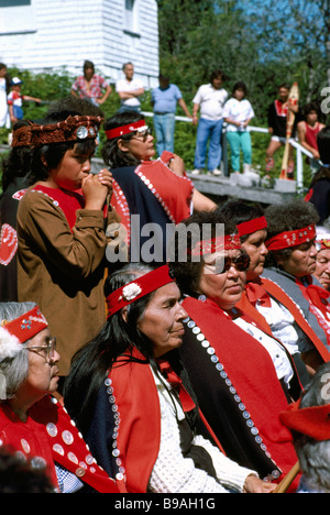 Native American Indians in Traditional Ceremonial Regalia celebrating at a Pow Wow in Bella Bella British Columbia Canada Stock Photo