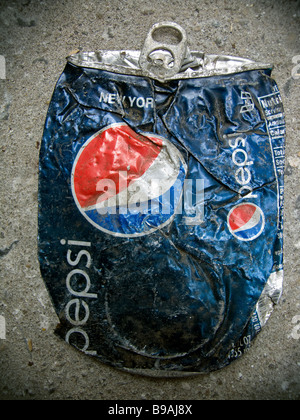 A can of Pepsi Cola crushed by a car on Saturday March 14 2009 Richard B Levine Stock Photo