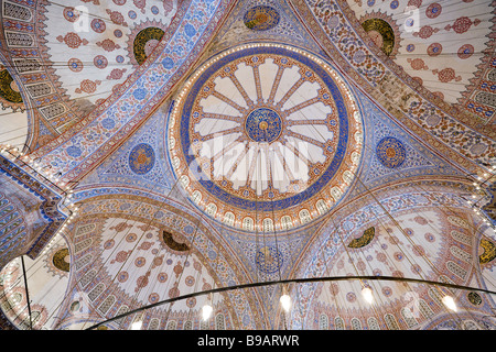 Awe  Inspiring Ceiling . The highly decorated ceiling of the Blue Mosque is formed with a central dome, arches and 4 semi domes. Stock Photo