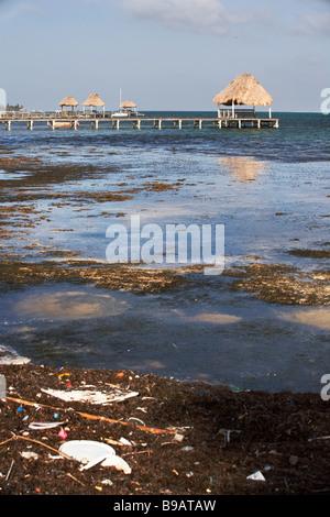 Trash and pollution is blown onto the beaches from the Gulf of Mexico. Stock Photo