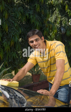 Man washing a car Stock Photo