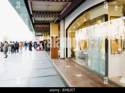 Group of people standing in front of a movie theater, New Delhi, India Stock Photo