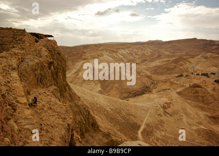 Dramatic view of massive siege ramp Romans built to allow them breach King Herod's formidable palace fortress atop big mesa Stock Photo