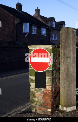 red with a white bar no entry circular traffic sign in the town centre of warwick Stock Photo