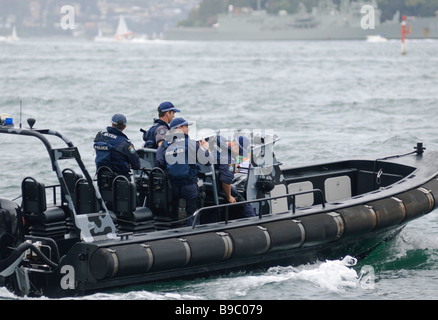 Police RHIB (Rigid Hull Inflatable Boat) provides security during a special event on Sydney Harbour. Stock Photo