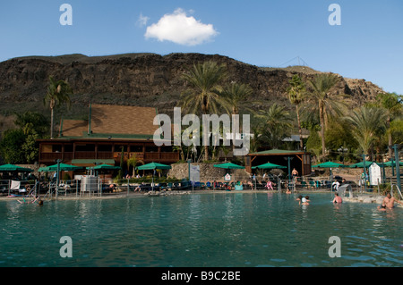 People bath in a pool in Hamat Gader or al-Hamma a hot springs site in the Yarmouk River valley in Golan Heights Israel Stock Photo