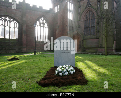 A mock gravestone erected by the Christian Aid charity to represent the people killed by the effects of climate change Stock Photo