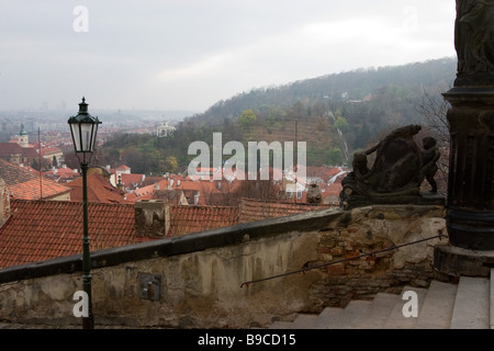 Autumn view  from Prague castle to roofs of Mala Strana houses and Petrin hill. Stock Photo