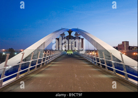 The Millennium lifting footbridge over the Manchester Ship Canal at night, Salford Quays, Greater Manchester, England Stock Photo