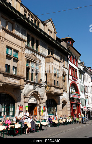 Guests sitting in pavement cafes at Barfüsserplatz barefoot square Basel Canton Basel Stadt Switzerland Stock Photo