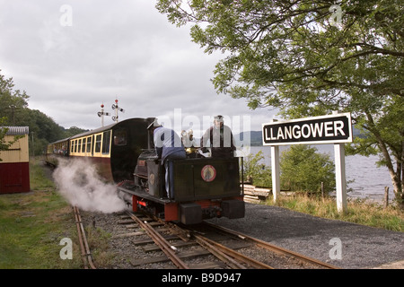 Wales Gwynedd Snowdonia Bala Lake Railway train at Llangower lakeside platform Stock Photo