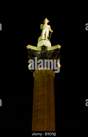 London at night , statue of Admiral Horatio Nelson on his column in Trafalgar Square designed by Sir Charles Barry 1840 - 1843 Stock Photo