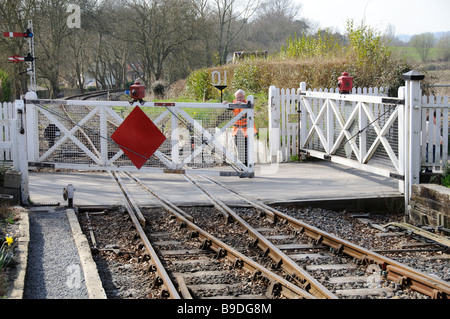 Unmanned railway level crossing gates on small country lane Stock Photo ...