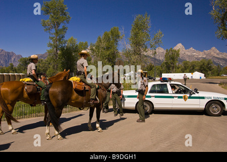 MOOSE WYOMING USA National Park service rangers on horseback and ranger car in Grand Teton National Park Stock Photo