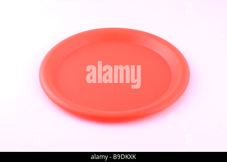 Empty plastic plate cutout against a white background Stock Photo