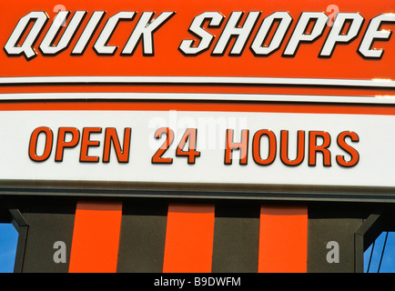 open 24 hours quick shoppe store sign Stock Photo