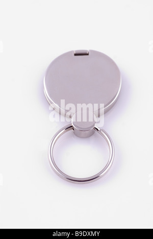 Silver key chain isolated against a white background Stock Photo
