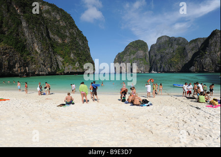 Tourists on the beach at Maya Bay off the island of Phuket Thailand Stock Photo