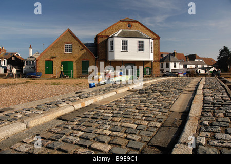 oyster restaurant Whitstable of the Whitstable oyster company on the sea front Kent uk with the slipway in the foreground Stock Photo