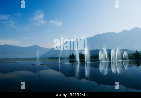 Fountains in a garden, Nishat Garden, Dal Lake, Srinagar, Jammu And Kashmir, India Stock Photo