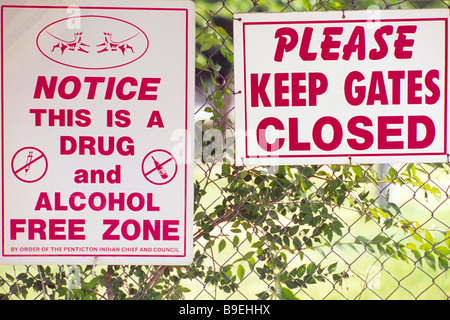 Notice This is a Drug and Alcohol Free Zone Sign and Please Keep Gates Closed Sign Stock Photo