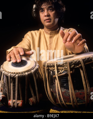 Indian musician Zakir Hussain, playing tabla, in London. Stock Photo