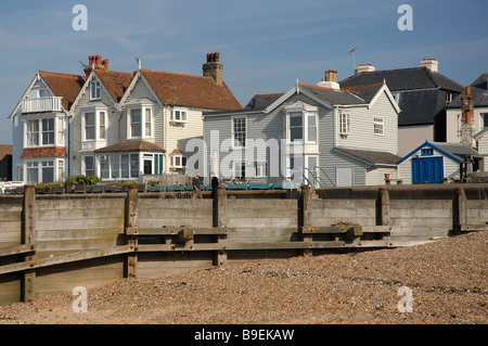 wooden shutter boarded houses on the sea front whitstable. Kent Uk Stock Photo