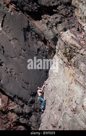 Climber ascends the Bastille, Eldorado Canyon State Park, Eldorado Springs, Colorado. Stock Photo
