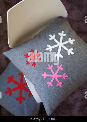Close-up of felt pillow on chair Stock Photo