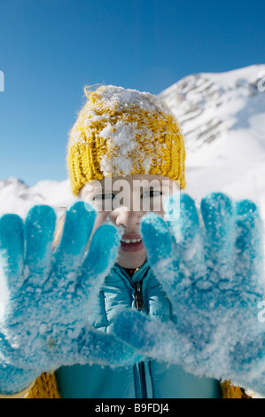 child playing in snow Stock Photo