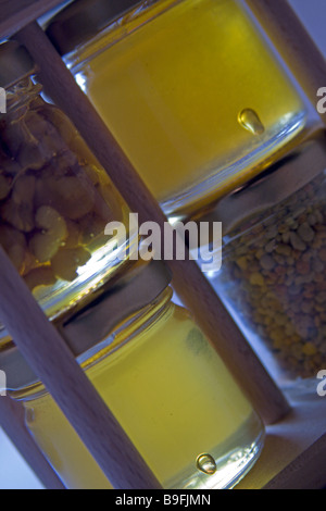 Honey and marmalade in the small jars. Home made food from the grandma's kitchen. Stock Photo