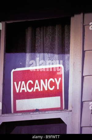 vacancy sign in window of house Stock Photo