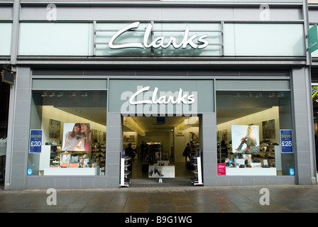 shoes business store shop front customer enters from mall staff serving interior shopping mall Lakeside Essex England UK Stock Photo - Alamy