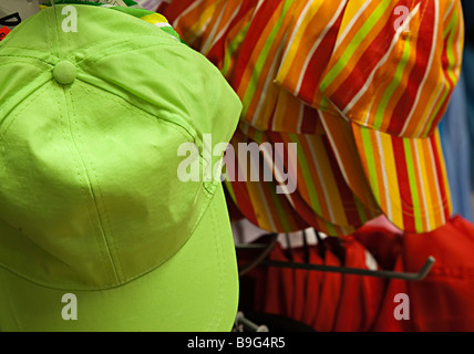 Green hat hanging on shop stand Germany Stock Photo