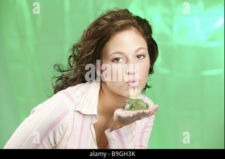 Woman young palp plastic-frog crown kisses portrait series people girl teenagers teenagers 18-20 years watching camera hand Stock Photo