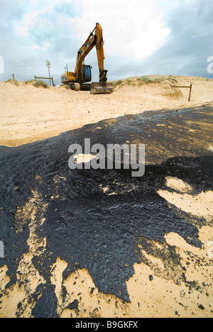 oil pollution on beach oil sludge Pacific Adventurer disaster Queensland 2009  Wednesday, 11 March , 2009 Stock Photo