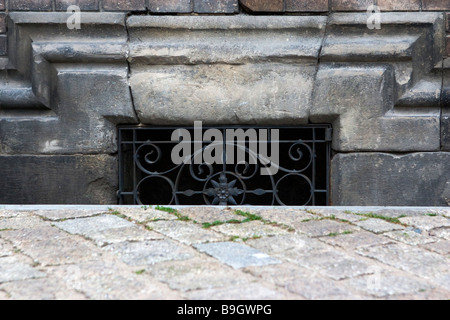 Below ground basement window in Provost house in Prague Castle. Stock Photo