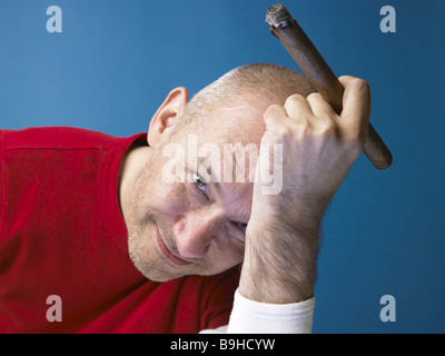 Man bald head cigar smokes smiling portrait series people designer stubble cigar-smokers smokers pleasing-products tobaccos Stock Photo