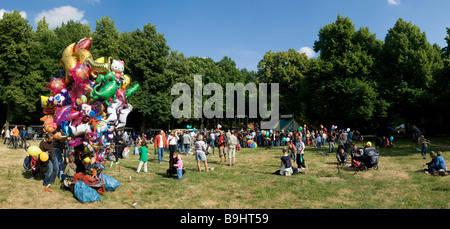 Children's festival with man selling balloons and a circus, Berlin, Germany Stock Photo