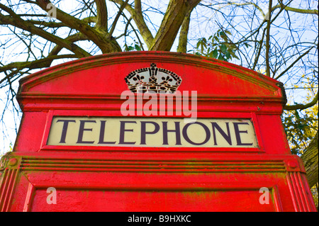 Close up of antique Red London telephone kiosk still in operation in Highgate North London. Stock Photo