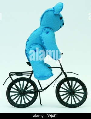 miniature-teddy-bear-riding-