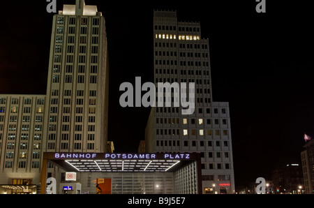 Night shot of the Bahnhof Potsdamer Platz, Potsdamer Platz Station, with Ritz Carlton Hotel behind, Berlin, Germany, Europe Stock Photo